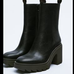 Brand New! Zara Rubberized Heeled Ankle Boots In Black. Size 11. Front And Back Pull Tabs. Zip Closure. Treaded Rubber Sole. Approx 3 1/2 In Heel. Chic High Ankle Heels With Lug Sole, Chic Ankle-high Heeled Boots With Lug Sole, Fall High Heel Boots With Lug Sole, Fall High Heeled Boots With Lug Sole, Black Heeled Boots With Heel Pull Tab For Fall, Platform High Ankle Heels For Work, Fall Ankle Boot Heels With Lug Sole, High Ankle Platform Heels For Work, Zara Ankle Platform Boots With Reinforced Heel