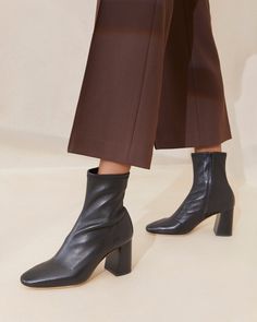 High heel ankle bootie in black stretch nappa leather. Padded footbed with gold stamped logo. Round toe, concealed side zipper. 3 inch heel. Loeffler Randall Shoes, Beautiful Boots, Leather High Heels, Loeffler Randall, Leather Pieces, Ankle Bootie, Black Booties, Sporty Style, Leather Booties