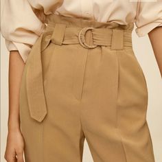 Belt Flowy Trousers Cropped Design, High Waist, Dart Detail, Flowy Fabric, Two Side Pockets, Two Welt Pockets On The Back, Loops, Belt Buckle Fastening, Concealed Button, Hook And Zip Fastening.. Viscous Polyester Summer Trousers With Belt, Summer Pants With Belt, Casual Beige Bottoms With Belt, Beige Belted Bottoms For Work, Flowy Trousers, Khaki Jumpsuit, Floral Palazzo Pants, Mango Pants, Flare Blouse