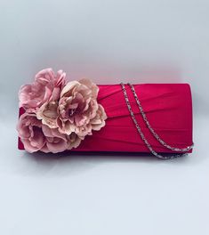 Stunning Bridal Wedding Satin Hot Pink Fuscia with Blush Dusky Dusty Pink Flowers Clutch Bag Perfect wedding accessory.   Elegant addition for those on the day essentials. Measurement  28cm x 11cm x 5cm Pink Formal Bag For Valentine's Day, Elegant Pink Bags For Valentine's Day, Elegant Pink Bag For Wedding Guest, Elegant Pink Clutch For Wedding, Elegant Flower Shaped Clutch For Formal Occasions, Pink Clutch Evening Bag With Detachable Handle, Pink Pouch Clutch For Wedding, Elegant Pink Wedding Clutch, High-end Pink Box Bag For Evening