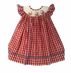 Adorable hand smocked sailboat dress perfect for the summer ! The colors are also perfect for The Fourth of July parties. Beach Smocked Cotton Dress, Beach Cotton Dress With Smocked Bodice, Playful Summer Smocked Dress With Smocked Back, Beach Smocked Cotton Dress With Ruffles, Cotton Smocked Dress For Beach, Cotton Smocked Dress For The Beach, Playful Summer Smocked Dress, Cotton Smocked Dress With Ruffles For Beach, Playful Smocked Beach Dress For Summer