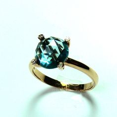 18K London Blue Topaz 9mm Accented with by ShowroomJewelry on Etsy, $125.00 Elegant Faceted Sapphire Ring, Faceted Blue Topaz Ring, Diamond Cut Blue Topaz Ring, Diamond Cut Topaz Ring, Luxury Faceted Topaz Round Ring, Faceted Topaz Ring For Formal Occasions, Formal Faceted Topaz Round Ring, Faceted Crystal Ring For Formal Occasions, Round Diamond Cut Topaz Ring