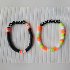 Handmade Halloween Bracelets Set Of 2 Halloween Novelty Black Bracelets, Trendy Black Wristband With Letter Beads, Novelty Black Beaded Bracelets For Halloween, Novelty Orange Bracelets For Halloween, Halloween Novelty Orange Bracelets, Casual Black Bracelets For Halloween, Adjustable Black Bracelets For Halloween, Handmade Black Wristband For Halloween, Halloween Black Adjustable Beaded Bracelets