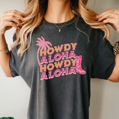 "🤠 Howdy cowgirl! Here's the perfect cute pink cowboy boot shirt for all your country fun SHEnanigans! 🎀 Comfort Colors© 🎀 100% ring spun cotton 🎀 Soft washed garment dyed fabric 🎀 Double needle collar 🎀 Twill taped neck and shoulders 🎀 Double stitched armhole, sleeve and bottom hem 🎀 Pigment dyed shirt colors will vary slightly 🎀 Superior dyeing process, reduces shrinkage by up to 99% 🎀 Durable, long lasting fabric created for a soft, \"broken in\" feel 🎀 Order up 1-2 sizes for an ov Pink Short Sleeve Western Top, Country Style Short Sleeve Tops With Letter Print, Casual Pink Tops For Rodeo, Aesthetic Cowboy Boots, Cute Country Shirts, Shirts Coquette, Pink Cowboy Boot, Aesthetic Cowboy, Pink Cowboy Boots