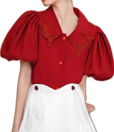 Fitted Embroidered Short Sleeve Top, Fitted Embroidered Top With Short Sleeves, Fitted Embroidered Tops With Puff Sleeves, Fitted Blouse With Embroidered Short Sleeves, Fitted Puff Sleeve Top With Floral Embroidery, Fitted Cotton Embroidered Top With Puff Sleeves, Fitted Embroidered Top With Puff Sleeves And Floral Design, Fitted Embroidered Top With Puff Sleeves, Embroidered Puff Sleeve Blouse