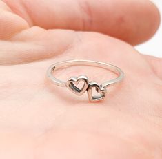 Sweet little sterling silver ring with two hearts joined!! Face height is 6mm. Available in size 6 only. - Genuine sterling silver - Size 6 only Stylish Jewelry Accessories, Silver Promise Rings, 3 Hearts, Two Hearts, Opal Ring, Stylish Jewelry, Opal Rings, Promise Rings, Sterling Silver Ring