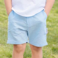 Geggamoja® of Sweden These comfortable, breezy shorts dress up any summer day! Made of sustainably sourced cotton and linen in a 50/50 blend. Lightweight, breathable shorts. 50% cotton, 50% linen. Two front pockets, one back. Front zipper. Machine wash, warm. (40 C°/ 104° F) Sizes (European size is based on child's full height in centimeters - see below) 74/80 (6-12+ mo) 86/92 (12-24 mo) 98/104 (3-4 yr) Conversion to height in inches 74/80 = 29 / 31.5 inches 86/92 = 33.5 / 36.5 inches 98/104 = 3 Playful Shorts With Pockets For Vacation, Playful Vacation Shorts With Pockets, Playful Bottoms For Summer Playwear, Playful Blue Bottoms With Built-in Shorts, Playful Summer Bottoms For Playwear, Cotton Shorts For Playtime, Blue Playwear Shorts For Summer, Relaxed Fit Shorts For Playwear, Spring Season, Relaxed Fit Shorts For Spring Playwear