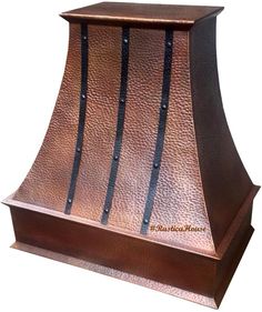 a copper colored stove hood with black lines on the front and sides, against a white background