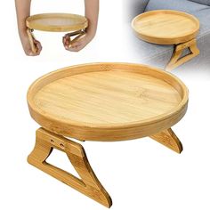 a person holding a wooden tray on top of a chair and another hand reaching for it