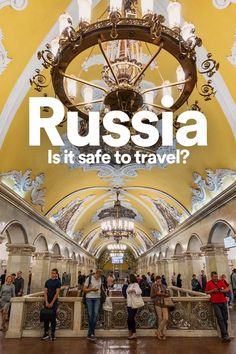 people are standing in an ornate building with the words, russian is it safe to travel?