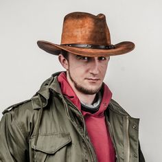 Brand new leather cowboy hat with wide ca.8 cm/3.15 inch brim. Made of genuine cattle leather (stiffened). There is a bendable metal wire in the external part of the brim. Hat with a leather sweatband inside and decorative leather belt as a band sewn down to the outside of the crown. On 1 side of the crown there are 3 ventilation eyelets. Crown height in the highest point is ca.13 cm/5.1 inch. Available in big xl and xxl sizes. Precise handmade craftsmanship from Sterkowski's family-run workshop Casual Leather Fedora For Rodeo, Rustic Leather Fedora For Rodeo, Casual Leather Hat Bands For Rodeo, Leather Fedora Hats For Rodeo, Rugged Leather Wide Brim Fedora, Rugged Leather Wide-brim Fedora, Leather Brimmed Fedora For Rodeo, Brown Leather Fedora For Rodeo, Rustic Leather Fedora For Western-themed Events