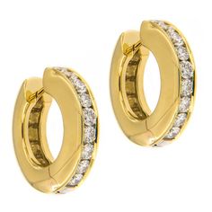 Understated and elegant, these earrings are perfect for a day at the office or an evening out. Showcasing 36 round brilliant cut diamonds and expert craftsmanship in 18k yellow gold with a unique spring hinge. This will be the most comfortable earrings you ever own! Diamonds 1.50 cttw 26.5 mm diameter. 4.5 mm wide. Gold Huggie Earrings, Day At The Office, Huggies Earrings, Round Brilliant Cut Diamond, Brilliant Cut Diamond, Round Brilliant, The Office, Gold Earrings, Diamond Cuts