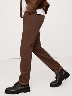 We updated our best-selling Traveler pant, keeping the same high-stretch comfort, but adding a more pronounced twill texture to the fabric.  Slim fit: Mid-rise.  Slim leg.  14" leg opening (from size 32).  Organic: Made with certified, organically grown cotton that's easier on the earth.  Fabric from Italy's Olimpias mill.  Zip fly with button closure.  Belt loops.  Five-pocket styling.  Slim fit: Mid-rise.  Slim leg.  Leg opening (from size 32): 14" Inseams: Short 30", Regular 32", Long 34" Mod Brown Straight Leg Pants With Side Pockets, Fall Pants With Comfort Waistband And Straight Hem, Casual Pants With Comfort Waistband And Straight Hem, Straight Hem Pants With Comfort Waistband For Elevated Casual, Elevated Casual Pants With Comfort Waistband, Straight Fit Bottoms For Fall, Straight Fit Bottoms With Straight Hem For Fall, Brown Chinos With Pockets And Straight Hem, Solid Stretch Pants With Five Pockets