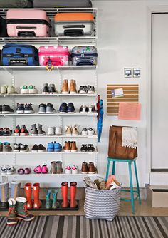 there are many pairs of shoes on the shelves