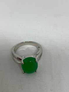 Vintage green nephrite jade Ornate German Silver ring, does not tarnish, NOT sterling Sizes 7, 8 or 9 All rings are shipped in a nice gift box. Check out our over a THOUSAND great reviews Engraving is $4 per letter and is not always perfect depending on the piece. It can take a few days if the jeweler is busy. This is payable to Paypal Judithsltd@gmail.com Modern Green Round Band Jewelry, Classic Green Jade Jewelry, Formal Green Jewelry With Round Band, Classic Green Opal Cabochon Ring, Polished Chrysoprase Ring Suitable For Gift, Classic Green Cabochon Ring, Green Open Ring For Formal Occasions, Green Open Ring For Formal Events, Classic Chrysoprase Ring Jewelry