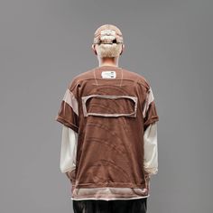 The Deconstructed Patchwork Jersey seamlessly blends street style with athletic aesthetics. Featuring a bold color-block patchwork design, this jersey stands out with its unique look. The left chest sports a branded badge, while the front hem is printed with "Petrichor" and the brand logo. The back is adorned with a thorny leaf patch, adding an extra layer of detail. Made from premium 100% cotton fabric, this jersey ensures both comfort and durability. The oversized fit provides a relaxed, moder Sporty Cotton T-shirt With Patchwork, Sporty Cotton T-shirt With Patchwork Details, Sporty Patchwork Cotton T-shirt, Patchwork Cotton Tops For Streetwear, Cotton Patchwork Top For Streetwear, Urban Cotton Patchwork Tops, Urban Cotton Color Block Tops, Sporty Patchwork Tops For College, Relaxed Fit Patchwork Top For Streetwear