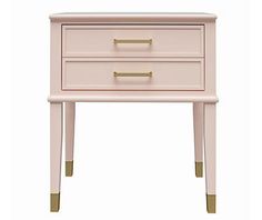 a pink nightstand with two drawers and gold handles on the bottom, against a white background