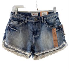 These Adorable Mudd Scalloped Lace Trim High Rise Shorts Are Perfect For Wherever Your Warm Weather Days Take You. Ideal Pair Of Shorts For Beach Wear. Sits High At The Waist. Comes From A Smoke/Pet Free Home. Questions Are Welcomed, Please Ask Before Buying. To Ensure The Proper Fit, Please Refer To The Measurements Provided. Features 28" Waist 10" Long . High Rise Denim Blue Five (5) Pockets Flat Front 67% Cotton, 32% Polyester 1% Spandex Zip/Button Fastening Waist Thank You For Looking!!! Vacation Denim Bottoms In Medium Wash, Denim Blue Denim Bottoms For Vacation, Medium Wash Denim Vacation Bottoms, Denim Jean Shorts With Frayed Hem For Vacation, Blue Denim Jeans For Vacation, Cute Denim Bottoms For Summer, Cute High Waist Denim Bottoms, Cute Summer Denim Bottoms, Cute High Waist Summer Jeans