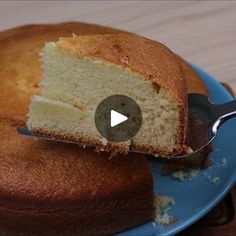 a piece of cake on a blue plate with a knife in it and the rest of the cake being eaten