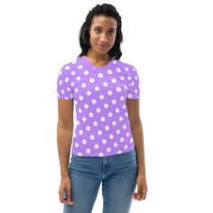 Step up your style game with the Women's Purple and White Polkadot Crew Neck T-Shirt! This shirt features a vibrant purple and white polkadot design that is sure to make a statement. The playful pattern is paired with a classic crew neckline, making this shirt a versatile addition to your wardrobe. This women's crew neck t-shirt is a versatile and comfortable addition to any wardrobe. Made from super smooth polyester, it feels soft and lightweight on the skin, making it perfect for everyday wear Playful Purple T-shirt With Graphic Print, Purple Crew Neck T-shirt With Character Print, Purple Cotton Crew Neck T-shirt, Cotton T-shirt With Polka Dot Pattern And Short Sleeves, Playful Purple Cotton T-shirt, Vibrant Purple, Casual Design, Purple And White, Stretchy Material