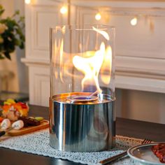 a table with food and a candle on it