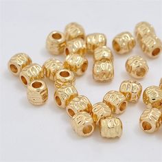 gold plated beads with holes in the middle