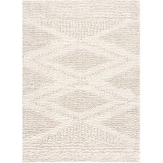 a white rug with an abstract design on the top and bottom part of it,