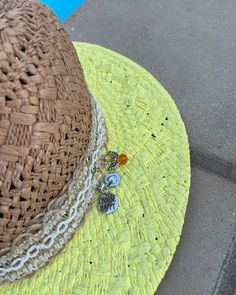 These are one of a kind Panama Hats! Featuring a hand painted brim, a unique and delicate hat ribbon, finished with cute little charms to brighten your day! The hat is constructed from 100% paper styled in a patterned weave accent. So super cute for the pool, the beach, bbq's, wine tasting, happy hour and more!! Makes a very special gift as well.Approx Measurements:Circumference: 22"Crown Height: 5.25"Brim: 3"100% Recycled Paper Hand Painted Panama Hat For Summer Vacation, Multicolor Hand Painted Straw Hat For Beach, Hand Painted Brimmed Sun Hat For The Beach, Spring Beach Sun Hat Hand Painted, Artistic Hand-painted Panama Hat For Beach, Brighten Your Day, Wine Tasting, Recycled Paper, Panama