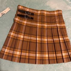 Trends Skirt/Popular/Hot Brand New Plaid Skirt Original/New With Tags Fall Mini Skirt For School, Y2k Style Mini Skirt For Fall, Y2k Mini Skirt For Fall, Y2k Fall Mini Skirt, Y2k Pleated Mini Skirt For Fall, Y2k Style Pleated Mini Skirt For Fall, Y2k Mini Skort For Fall, Y2k Style Fitted Brown Skirt, Trendy Pleated Brown Mini Skirt