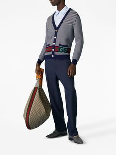 Gucci Interlock G-logo V-neck Cardigan - Farfetch Casual Gucci V-neck Outerwear, Luxury Gucci V-neck Outerwear, Gucci Casual Blue Sweater, Gucci Blue Casual Sweater, Casual Blue Gucci Sweater, Classic Gucci V-neck Cardigan, Gucci Luxury V-neck Cardigan, Luxury Gucci V-neck Cardigan, Designer Gucci V-neck Sweater