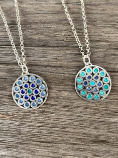 Blue Sterling Silver Fusion Necklace, Blue Fusion Style Round Pendant Jewelry, Blue Flower Pendant Necklace Nickel Free, Blue Nickel-free Flower Pendant Necklace, Blue Round Fusion Necklaces, Blue Sterling Silver Amulet Jewelry, Blue Fusion Jewelry With Large Pendant, Nickel Free Blue Amulet Necklace, Blue Medallion Pendant Jewelry