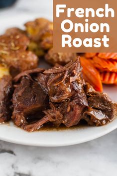 french onion roast on a plate with carrots and potatoes