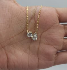 This is a beautiful Lab Grown diamond design pendant. It is set in real solid 14Kt Gold and the chain is 14Kt Gold as well.  You can choose if you want 14Kt White Gold, 14Kt Yellow Gold or 14Kt Rose Gold.  We have a lot of beautiful jewelry with natural diamonds. If any listing states "diamond" then it is a natural diamond. If the listing states "Lab Grown" it is a Lab Grown diamond. The chain is attached to the diamond and sits comfortably on you when you wear it. This is the perfect gift for mom, wife, fiancee, girlfriend, valentine, daughter, family or friend. It is a special gift for mother's day, valentine's day, wedding, anniversary, birthday, Christmas, Easter, New Year's and any holiday. Pendant Size: 11mm (0.433 inches) x 8.55mm (0.336 inches) x 5.45mm (0.214 inch) Pear shape Diam Yellow Gold Pear-shaped Diamond Solitaire Necklace, Gold Teardrop Diamond Necklace With Vvs Clarity, Teardrop Diamond Necklace In 14k Gold For Anniversary, Gift Pear-shaped Diamond Necklace With Single Cut Diamonds, Yellow Gold Teardrop Diamond Necklace For Anniversary, Teardrop Solitaire Necklace With Single Cut Diamonds For Anniversary, Diamond White Pear-shaped Necklace For Anniversary, Pear-shaped Diamond White Diamond Necklace For Anniversary, Anniversary Teardrop Solitaire Necklace With Single Cut Diamonds