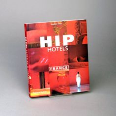 a book with the title'hip hotels france'written in red and white on it