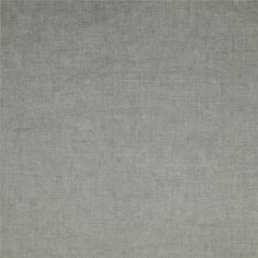 an area rug that is plain and grey