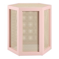 a pink and beige side table with wicker design on the top, against a white background