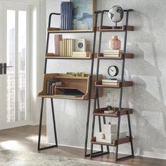 a bookshelf with several shelves on top of it