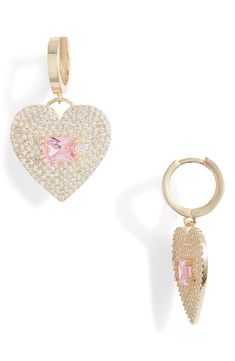 A pink-hued cubic zirconia centers the heart-shaped charms on sweet huggie hoop earrings plated in high-shine 14-karat gold. 3/4" drop Sterling silver/14k-gold plate/cubic zirconia Imported Hoop Drop Earrings, Huggie Hoop Earrings, Gold Drop Earrings, Gold Earrings, Cubic Zirconia, Gold Plate, Jewelry Earrings, Hoop Earrings, Charms