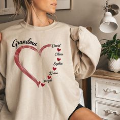 Personalized Grandma Sweatshirt, Grandma Heart Sweat, Christmas Gigi Tee-shirt, Abuela T-shirt, Grandkids Name Shirt, Gift For Grandma, Nana Crewneck, Gigi Shirt, Valentines Gift for Grandma You are welcome to Tabithas Fashion store! I'm here to help you to have a good shopping experience as much as I can. If you have any request (more size and color options) please feel free to message me. I will reply as soon as possible. * Please note: This design will be made with Direct To Fabric print (DTF). * I have listed some information to help you below: - Price is for 1 shirt. 𝑶𝑹𝑫𝑬𝑹𝑰𝑵𝑮 𝑰𝑵𝑭𝑶 1- Please check all the photos from the listing. 2- Please choose your T-shirt, Sweatshirt, or Hoodie size and color. (T-shirt, Sweatshirt, or Hoodie sizes are shown on the listing photos) 3- Ple Gigi Shirts, Grandma Sweatshirt, Personalized Grandma, Gift For Grandma, How To Clean Iron, Fabric Print, Valentines Gift, Grandma Gifts, Cool Suits