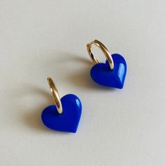 The earrings are made of polymer clay, they are ultra light on the ear, on a surgical steel support, nickel-free stud earrings with a silicone stopper. Will not cause irritation, your lobes will thank you! the heart measures 1.5cm in diameter. All buckles are designed and made by hand in France, they are unique and may vary slightly in color and shape. Polymer clay is a slightly flexible material. The buckle is covered with a light layer of resin so that it is more robust and shiny. The earrings Heart Earrings Dangle, Trendy Blue Heart Earrings For Gift, Blue Heart Charm Earrings For Valentine's Day, Blue Heart-shaped Earrings For Valentine's Day, Trendy Blue Heart-shaped Jewelry, Blue Hypoallergenic Hoop Earrings As Gift, Blue Hypoallergenic Hoop Earrings For Gift, Blue Heart-shaped Earrings With Ear Wire, Blue Huggie Earrings For Everyday