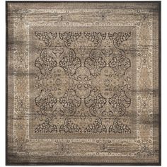 an area rug with intricate design on the center and sides in beige, black and tan colors