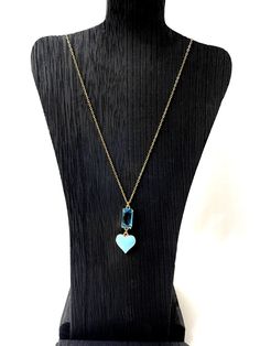 This baby blue is in an 18K gold plated chain with baby blue Chrystal and a blue heart pendant in gold color.  The chain measures 19.5IN/50CM/1OZ.  A delicate and minimalist look for the one you love. Blue Heart Pendant Necklace With Birthstone, Blue Gold-plated Birthstone Jewelry, Blue Birthstone Gold-plated Jewelry, Blue Dainty Necklace With Heart Charm, Blue Birthstone Heart Pendant Necklace, Blue Birthstone Jewelry In Gold Plated, Dainty Blue Necklace With Heart Charm, Dainty Blue Heart-shaped Necklace, Blue Gold-plated Charm Necklace With Adjustable Chain