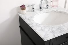 From its carrara white marble top to its contemporary style handpainted cabinet, it is sure to update your bathroom. Beneath its lustrous, natural stone marble top is an oval, white porcelain under-mount sink, removable shelf, for storing all your bathroom essentials. Elegant Decor Home Furnishing 21-in Black Undermount Single Sink Bathroom Vanity with Carrara White Marble Top | HF37563BK Black Vanity Bathroom, Black Sink, Bathroom Size, White Marble Countertops, Dining Sets Modern, Single Sink Bathroom Vanity, Bathroom Vanity Tops, Sink Bathroom, Living Room Leather