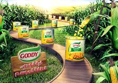 an advertisement for goody corn on the cob is shown in front of some corn stalks