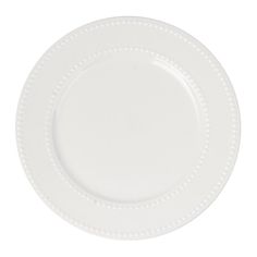 an empty white plate with beading on the rim is shown in front of a white background