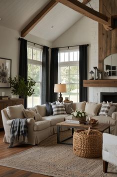 a living room filled with furniture and a fire place in the middle of a room