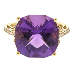 View this exquisite work of art, the CIRARI 14K Gold Amethyst Ring, which exudes charm and skill. Exuding a noble allure, this magnificent ring displays a brilliant amethyst gently nestled inside a finely wrought 14K gold setting. This ring is an invitation to revel in the classic elegance of CIRARI. It is a sign of sophistication and refinement that goes beyond the ordinary. With this exquisite piece of jewelry, you can appreciate the marriage of elegance and workmanship while elevating your st Luxury Cushion Cut Gemstones For Wedding, Luxury Cushion Cut Gemstones With Prong Setting, Luxury Amethyst Gemstones With Accent Stones, Luxury Formal Hallmarked Gemstones, Luxury Diamond Cut Gemstones For Formal Occasions, Luxury Yellow Gold Amethyst Ring With Gemstone Accents, Luxury Amethyst Ring With Prong Setting, Luxury Purple Diamond Ring For Formal Occasions, Luxury Diamond Cut Amethyst Ring For Formal Events