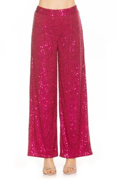 Sparkling sequins bring dazzling allure to a pair of stretch pants that are elevated by a wide leg and mid rise. Banded waist Invisible back zipper 90% polyester, 10% spandex; lining content: 100% polyester Hand wash cold, lay flat to dry Imported Model stats: 5'10", 32" bust, 25" waist, 36" hip. Model is wearing size X-Small. Sequin Pants, Stretch Pants, In Hot, Lay Flat, Mid Rise, Denim Jeans, Hot Pink, Sequin, Wide Leg