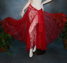 will fit size 1/2-7/8 Envelop yourself in the romantic beauty of this wrap-style ballroom skirt, crafted from yards of soft, red lace and designed with fluttering petal-like panels. Perfect for studio dances, social events, dance teachers, practice sessions or any special occasion - a look sure to make a lasting impression! Customization can be added to most any dress! Variations can be custom made especially for you! Dependent on other orders, allow 6-10 weeks for custom orders. For any questio Dress Variations, Red Lace Skirt, Dance Teachers, Tango Dress, Red Petals, Dance Pants, Ballroom Dance Dresses, Soft Red, Dance Skirt