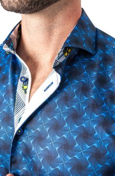 A mesmerizing abstract pattern covers this luxe shirt cut from fine cotton designed to keep you looking and feeling your best. Spread collar Long sleeves with button cuffs 100% cotton Machine wash, dry flat Made in Turkey Blue Long Sleeve Top With Geometric Pattern, Elegant Shirt With Button Closure And Patterned Design, Formal Collared Patterned Shirt, Designer Fitted Blue Shirt, Designer Patterned Printed Shirt, Designer Blue Tops With Buttons, Blue Collared Shirt With Geometric Pattern, Blue Geometric Pattern Collared Shirt, Fitted Collared Shirt With Geometric Pattern